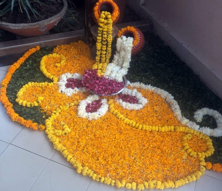Flower Rangoli at the Entrance